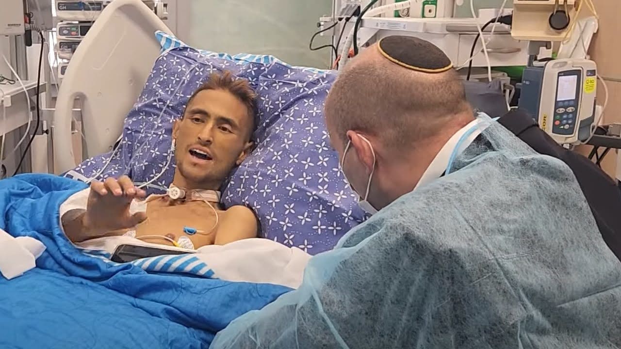 NAFTALI BENNETT visits Sgt. Yona Brief, wounded in Kfar Aza on Oct. 7. After 417 days of hospitalization, Brief succumbed to his injuries.