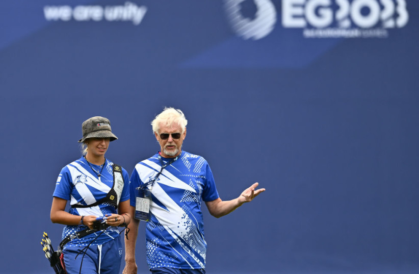 MIKAELA MOSHER from Israel and coach Richard John Priestman during Archery - Women's Recurve Individual at day eight of the European Games 2023 at Plaszowianka Archery Park on June 27, 2023 in Krakow, Poland.