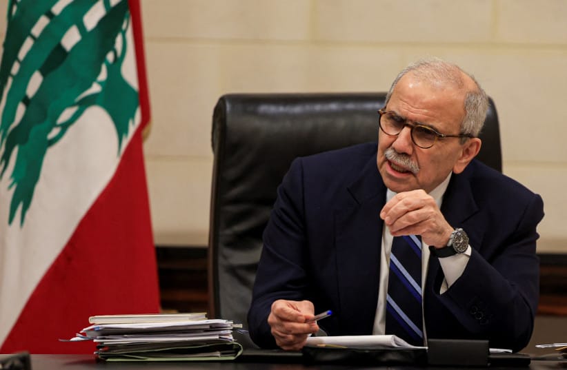 Lebanese Prime Minister Nawaf Salam speaks to journalists at the government headquarters in Beirut, Lebanon, December 3, 2025. (credit: REUTERS/MOHAMED AZAKIR)