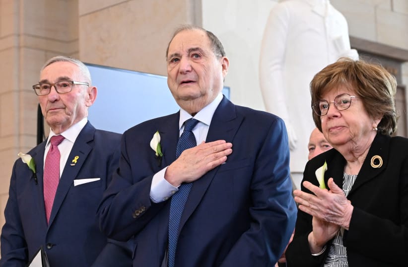 Holocaust survivor Abraham Foxman (C) becomes emotional after speaking at a remembrance honoring the victims of Nazi persecution at the US Capitol in Washington, DC, on April 23, 2025.