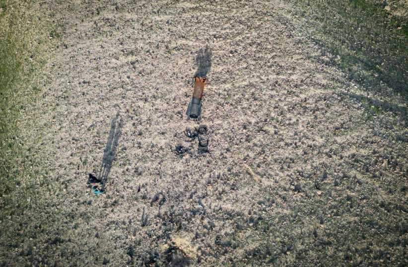 Part of an Iranian ballistic missile is seen in the desert near the city of Araf after being fired towards Israel during the war with Iran, April 16, 2026.