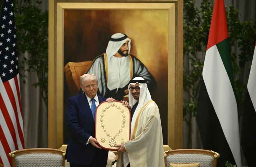 US President Donald Trump receives the Order of Zayed, UAE's highest civil decoration named after the first president of the UAE, Zayed bin Sultan Al Nahyan, from his UAE counterpart Sheikh Mohamed bin Zayed Al Nahyan, at Qasr Al-Watan/Palace of the Nation in Abu Dhabi on May 15, 2025; illustrative.