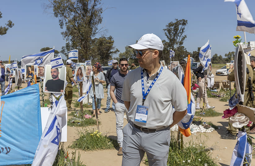 Larry Olschwanger at the memorial site of the Nova music festival on a solidarity delegation with Israel Bonds.