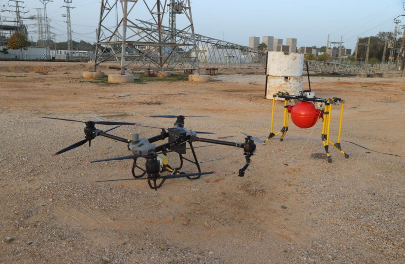 Airborne robotic system for installing and removing warning balls
