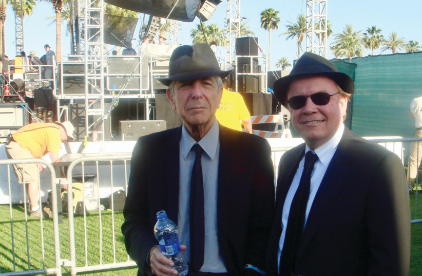 Cohen with then-manager Robert Kory at the Coachella festival in Indio, California, 2009.