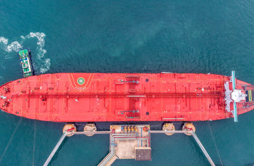 This aerial photo shows a tanker unloading imported crude oil at a terminal port in Qingdao, in China's eastern Shandong province on May 14, 2026.