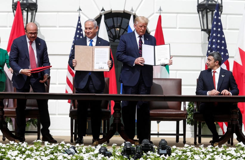 Bahrain's Foreign Minister Abdullatif Al Zayani, Israel's Prime Minister Benjamin Netanyahu, US President Donald Trump and UAE Foreign Minister Abdullah bin Zayed participate in the signing of the Abraham Accords in Washington, September 15, 2020.