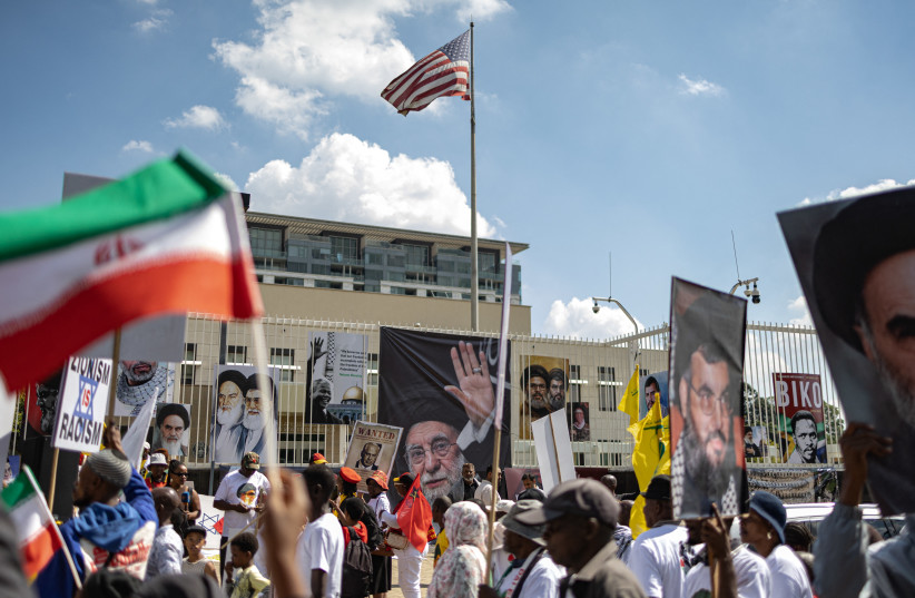 Protesters gather outside the US Consulate in Johannesburg on March 7, 2026, during a demonstration against the ongoing war involving the United States, Israel and Iran, with protesters expressing solidarity with Iran, Yemen and Palestinians.