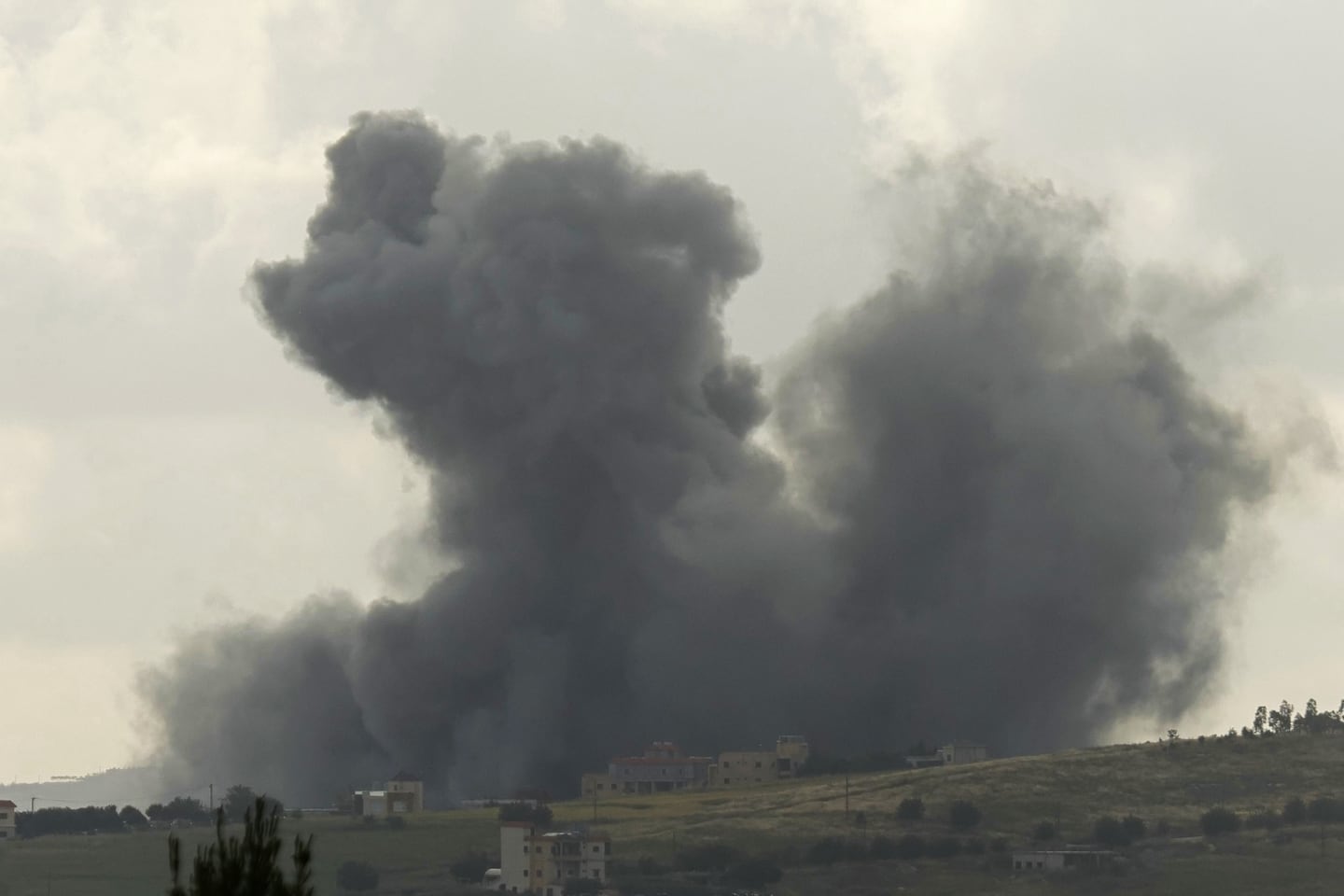 Smoke rises from the site of an Israeli airstrike that targeted the southern Lebanese village of Kfar Tibnit on May 15, 2026. Israel carried out new strikes in southern Lebanon that it said targeted the militant group Hezbollah on May 15, hours before the two countries' envoys were set to meet for a second day of peace talks in Washington.