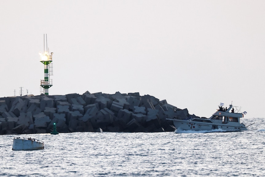 A boat approaching a port.