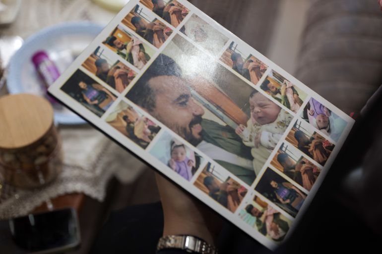 The father was killed five hours after his daughter was born, after seeing her and holding her in his arms at the hospital that day [Abdelhakim Abu Riash/Al Jazeera]