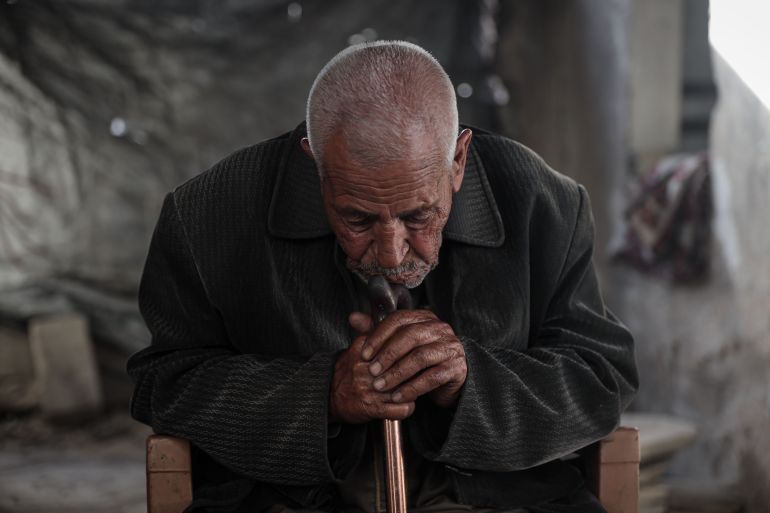 Abdel Mahdi al-Wuheidi holding his stick
