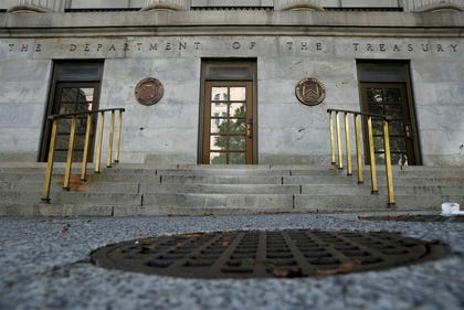 Signage is seen at the United States Department of the Treasury headquarters in Washington, D.C., U.S., 2020. Credit: Andrew Kelly/Reuters Signage is seen at the United States Department of the Treasury headquarters in Washington, D.C., U.S., 2020.