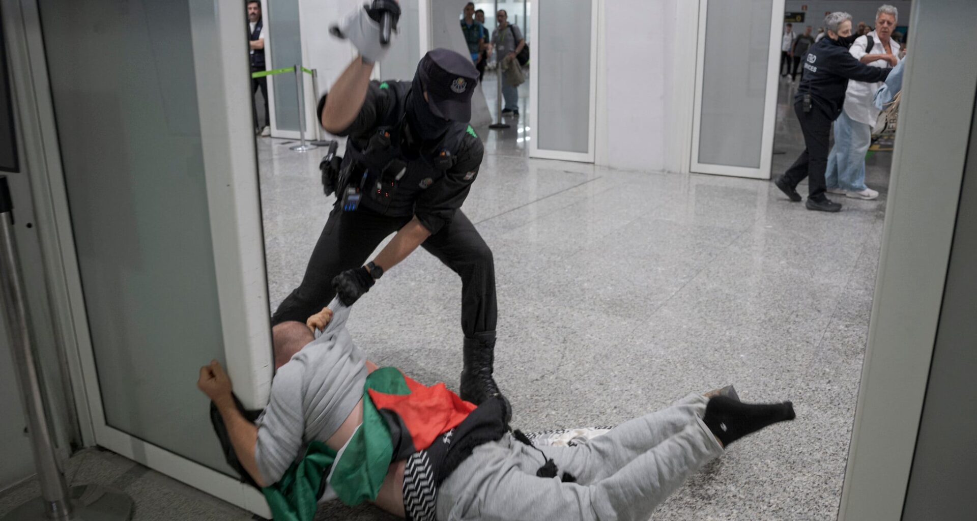 Spanish police beat and detain Gaza flotilla activists amid clashes at airport