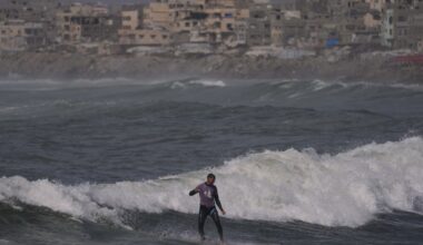 Surfers in war-torn Gaza find rare moments of relief taking to the waves