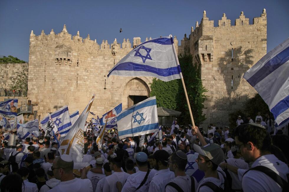 Jewish ultra-nationalists celebrate at Damascus Gate during the annual Jerusalem Day march commemorating Israel's capture of East Jerusalem in the 1967 Mideast war, ion May 14, 2026