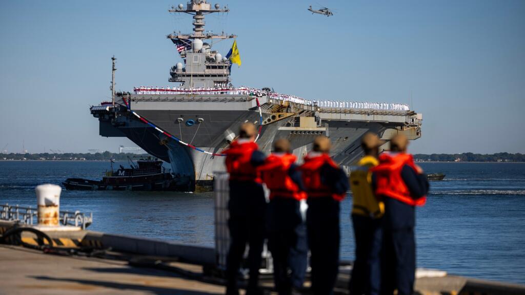 The USS Gerald R. Ford pulls up to Pier 11 at Naval Station Norfolk in Norfolk, Va. on Saturday, May 16, 2026, following an 11 month deployment.