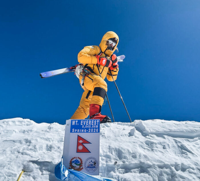 bartek Ziemski on the summit of Everest with skis on the backpack and no O2.