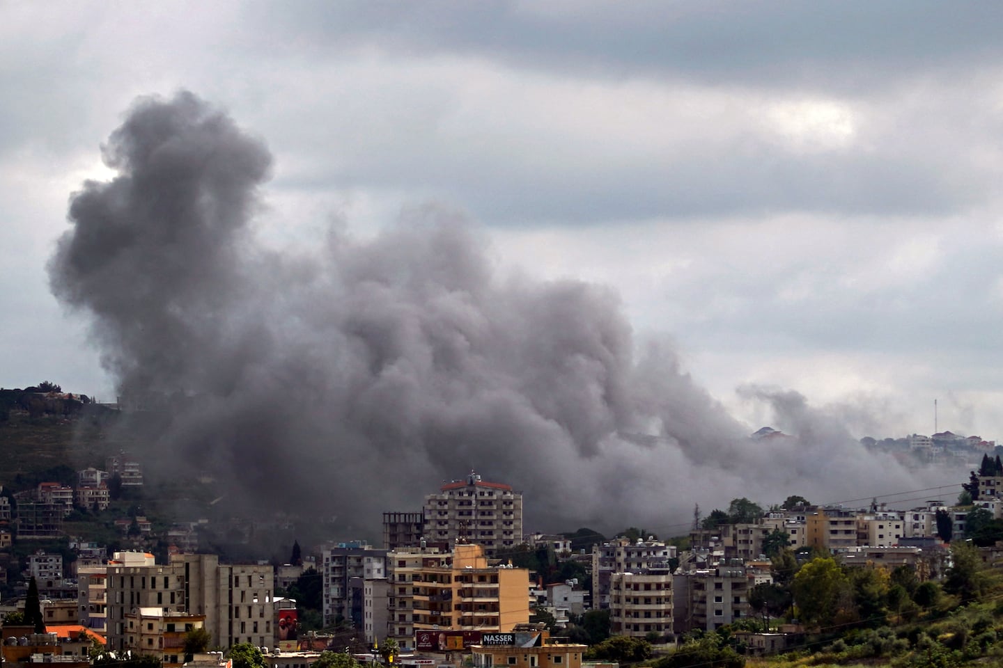 Smoke rises from the site of an Israeli strike that targeted the Nabatieh village in southern Lebanon on May 22, 2026. An Israeli strike on southern Lebanon killed six people on May 22, including two rescuers and a child, the Lebanese health ministry said, despite a fragile ceasefire in the Israel-Hezbollah war.