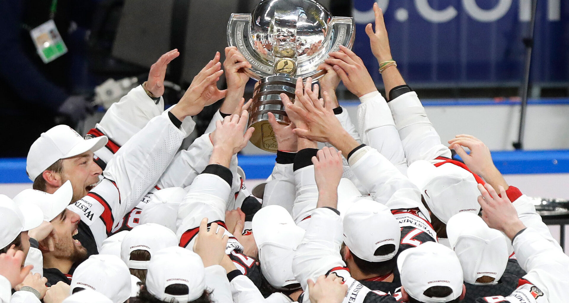 Team Canada players lift the trophy after winning the 2021 IIHF World Championship.