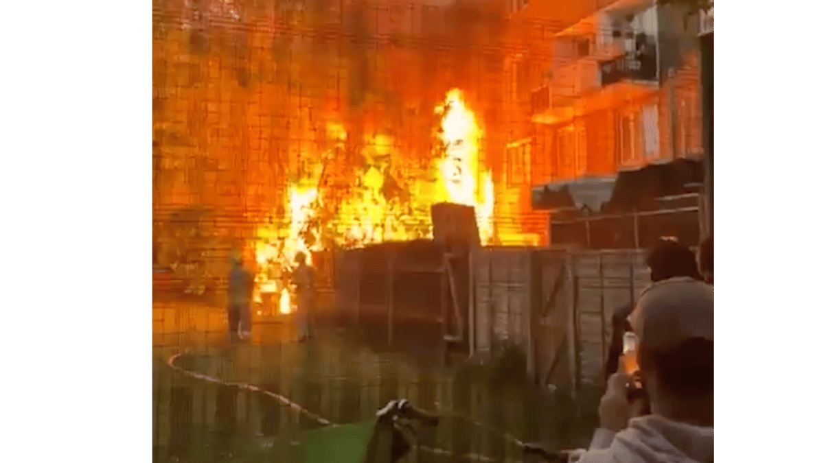 Clapton fire: Huge blaze at block of flats under investigation as column of smoke seen across London