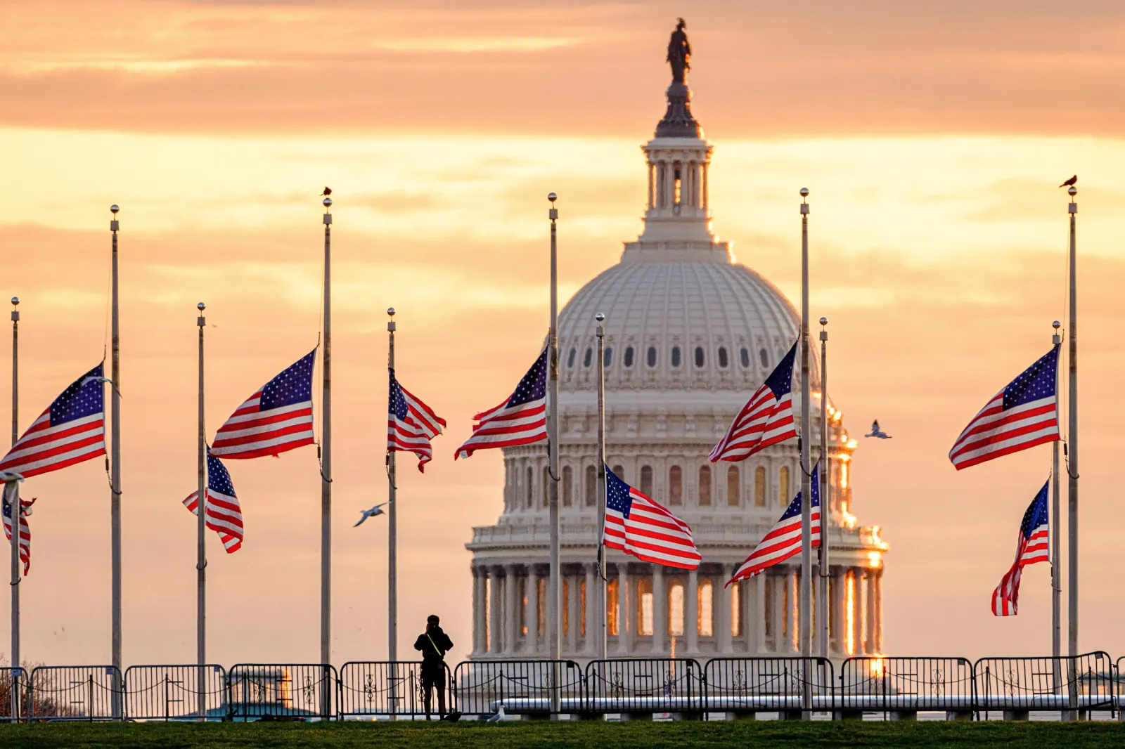 File image: U.S. flags on the National Mall fly at half-staff at daybreak with the U.S. Capitol in the background in honor of the passing of former U.S. President Jimmy Carter on December 30, 2024, in Washington, DC.
