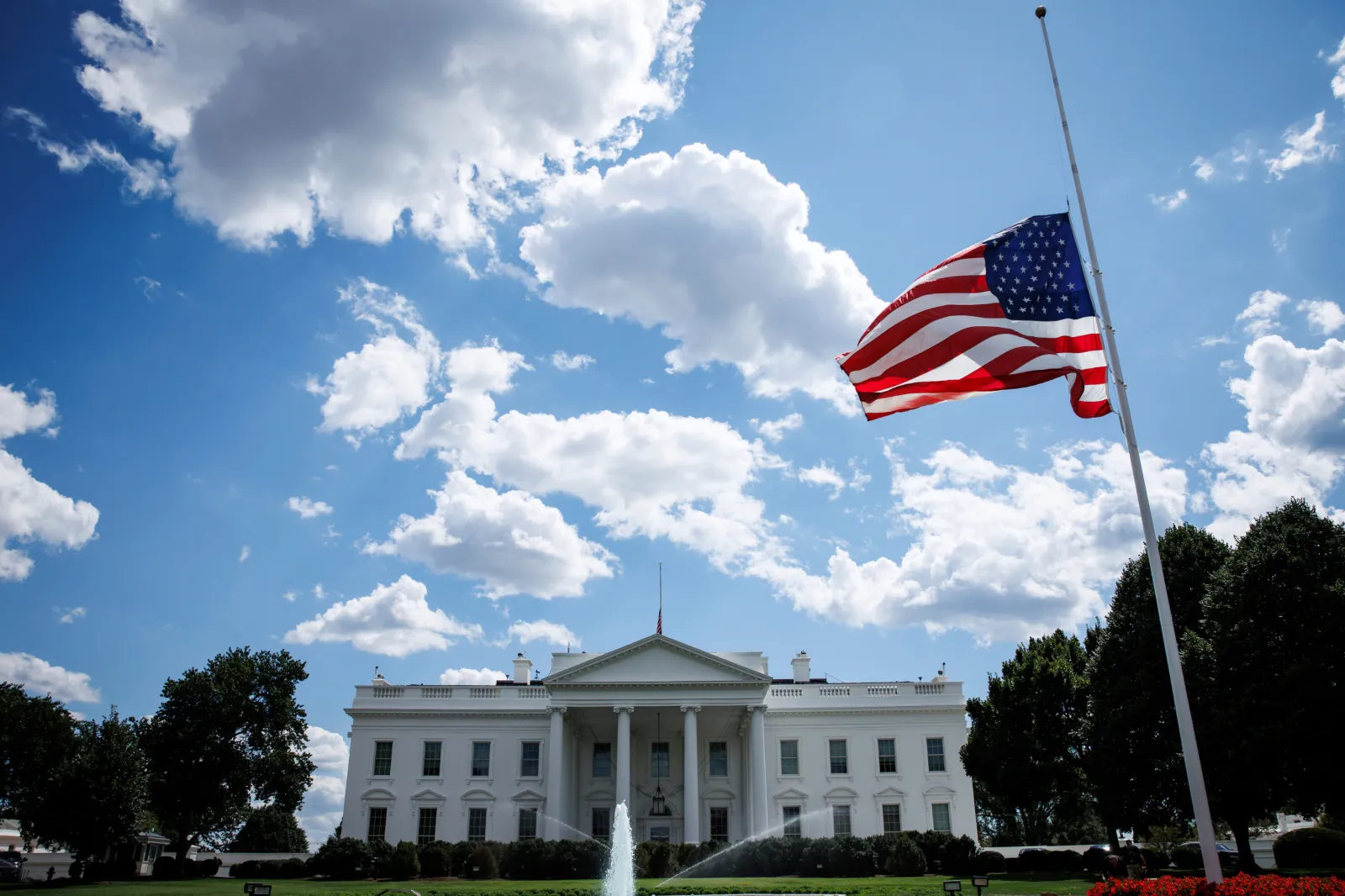 File image: The U.S. flags at the White House are flown at half staff on August 27, 2025 in Washington, D.C.