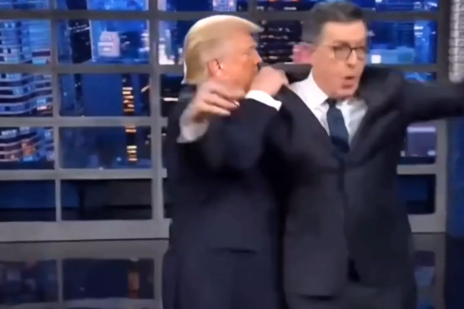 AI-generated clip of President Donald Trump throwing Late Show host Stephen Colbert into a green dumpster posted on Truth Social, May 22, 2026
