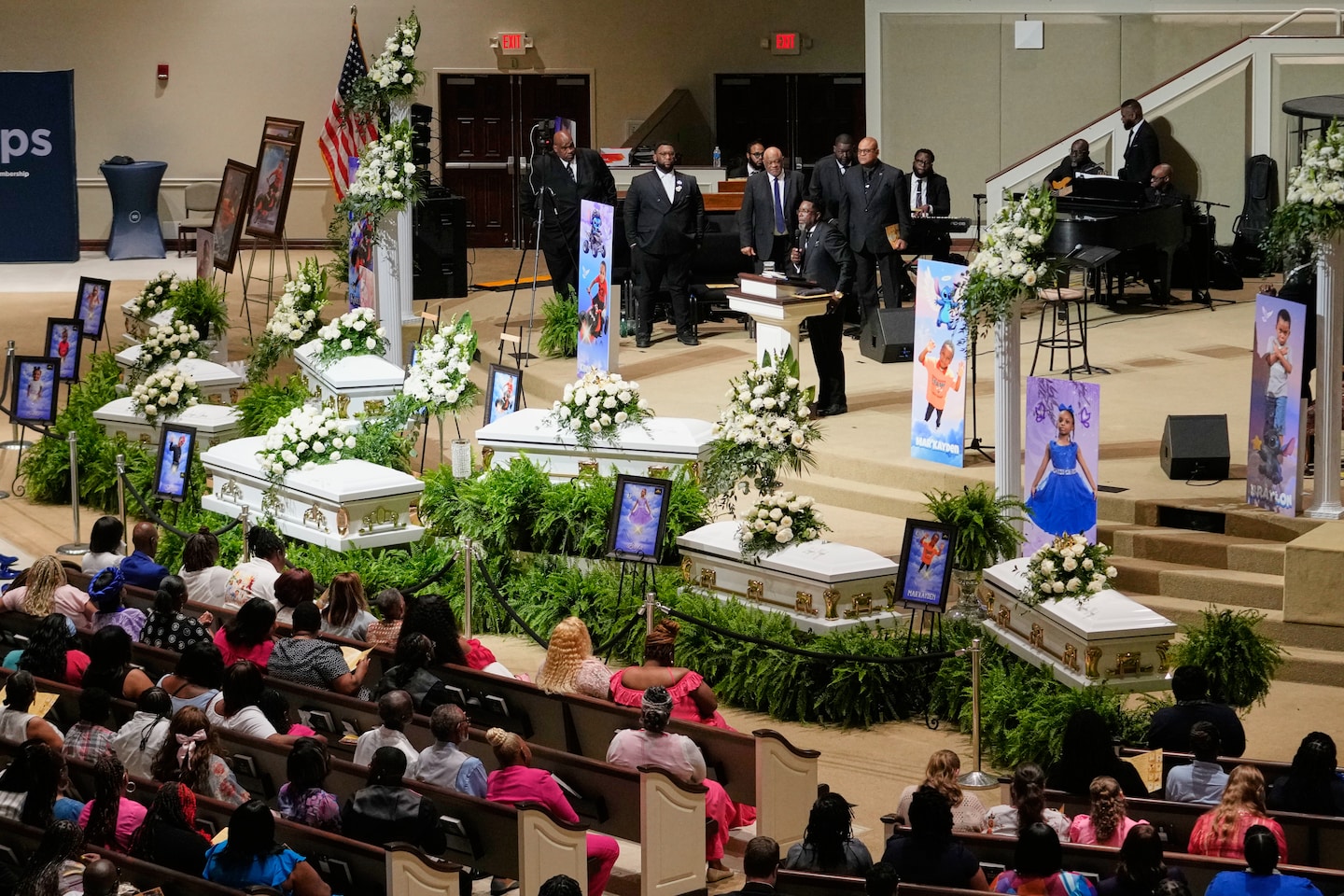 Eight murdered children mourned at mass funeral that captured national attention