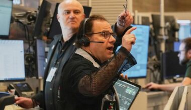 US stocks edge up toward more records as crude oil prices ease