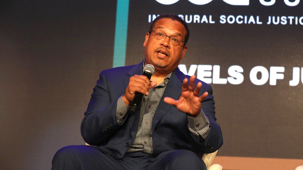Keith Ellison speaking during a panel discussion at a social justice summit in New York City
