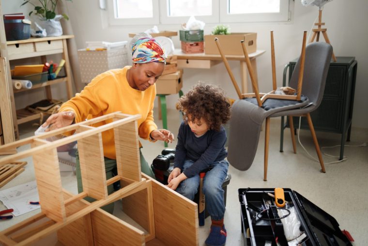 Furniture assembly in new apartment - stock photo