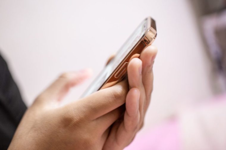 An image of a hand that quickly sends an email - stock photo