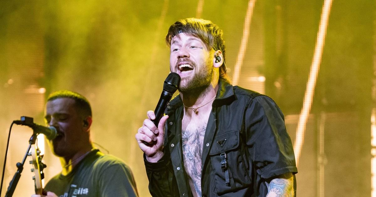 Rock frontman comes out as a 'proudly gay man' after split from wife