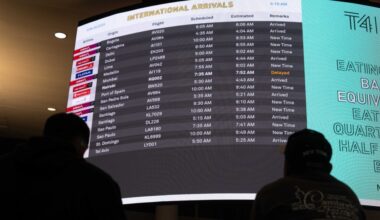 U.S. issues Ebola travel restrictions, first infected American identified
