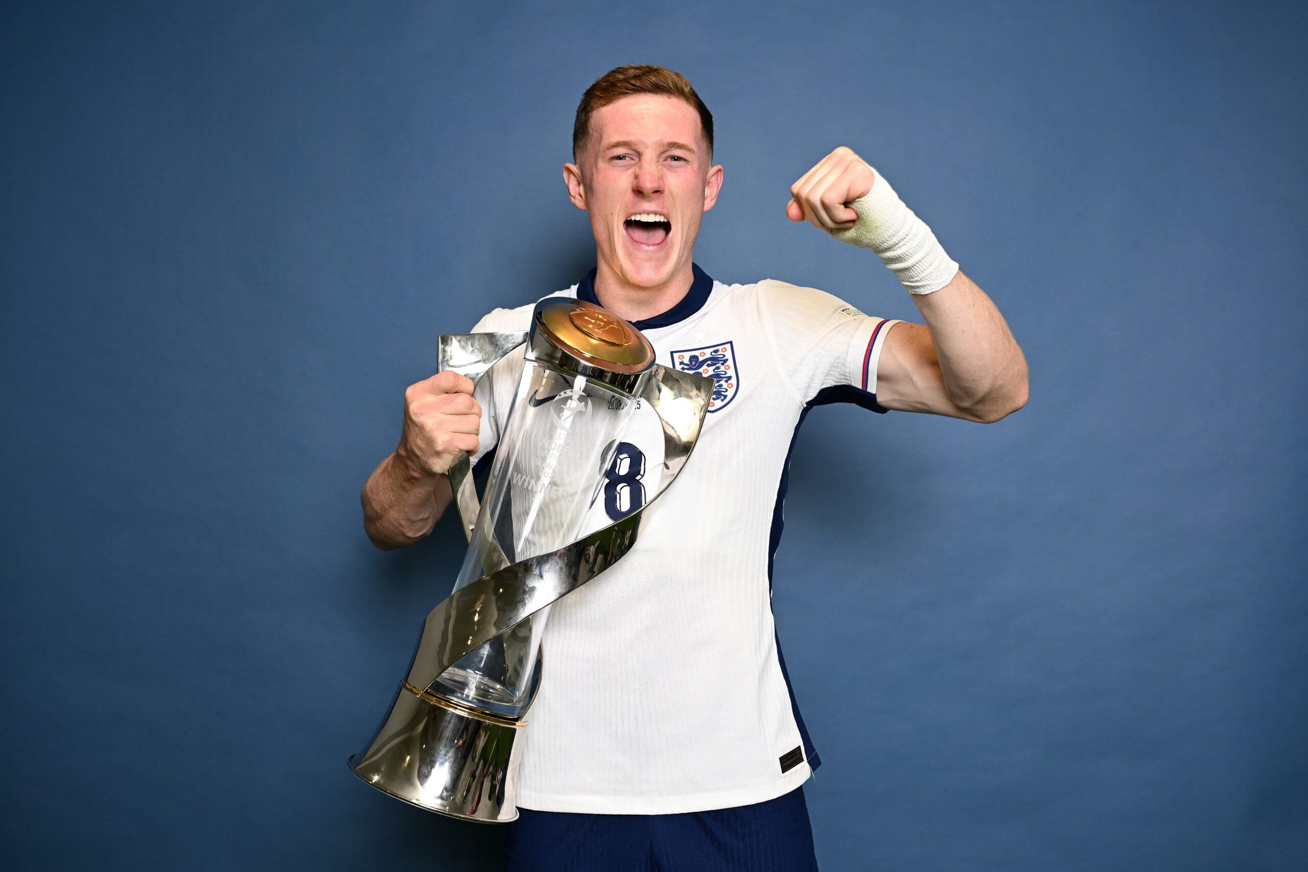 Elliot Anderson pictured with the under-21 European Championship trophy