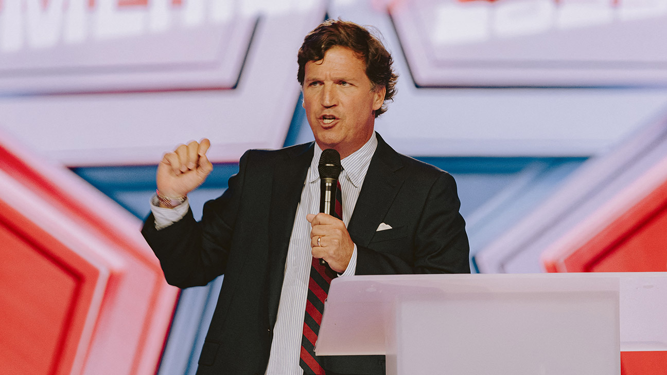 Conservative political commentator and podcast host Tucker Carlson speaks at Turning Point's annual AmericaFest conference, in remembrance of late right-wing political activist Charlie Kirk, in Phoenix, Arizona on December 18, 2025.