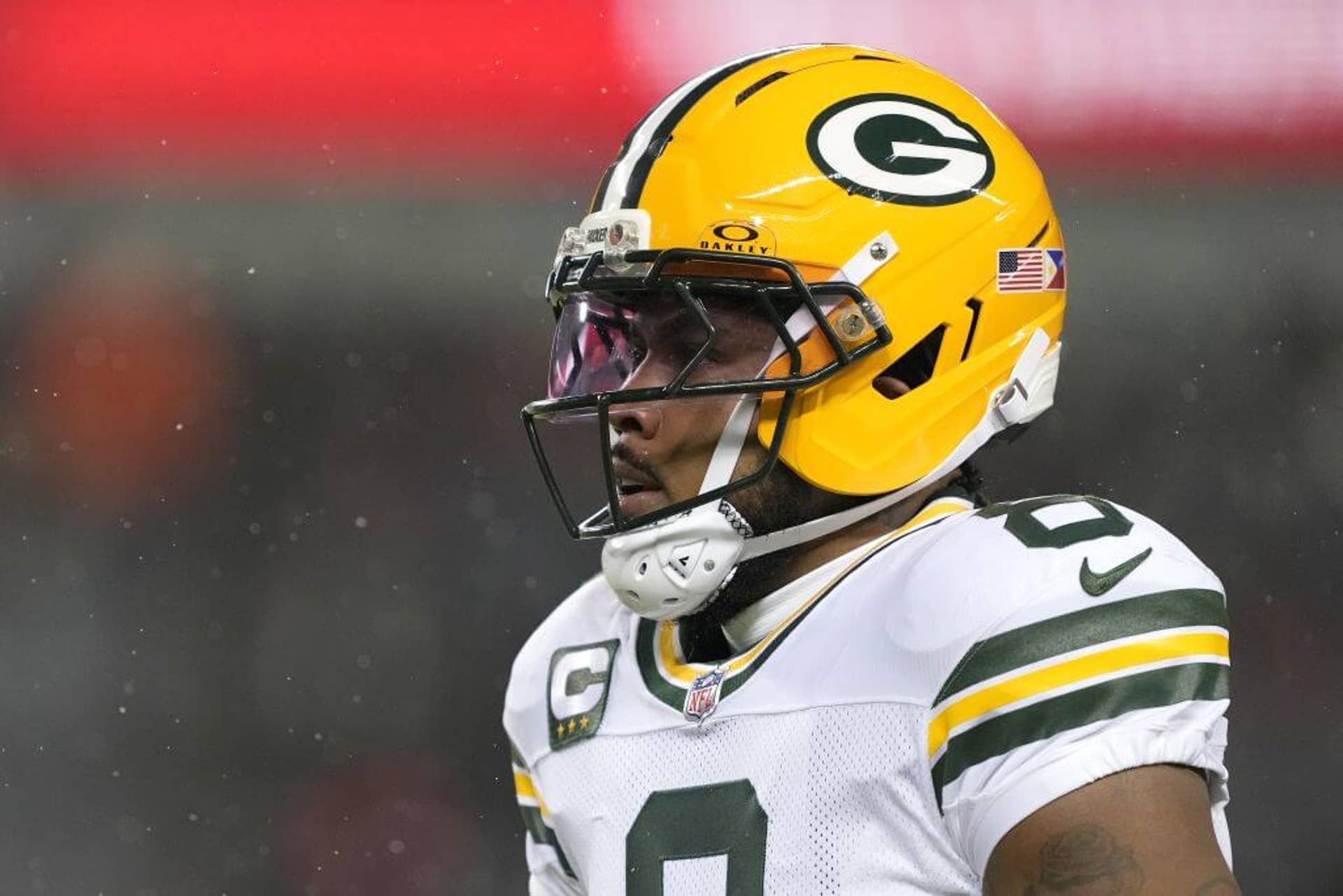 Green Bay Packers running back Josh Jacobs warms up before a game against the Chicago Bears.