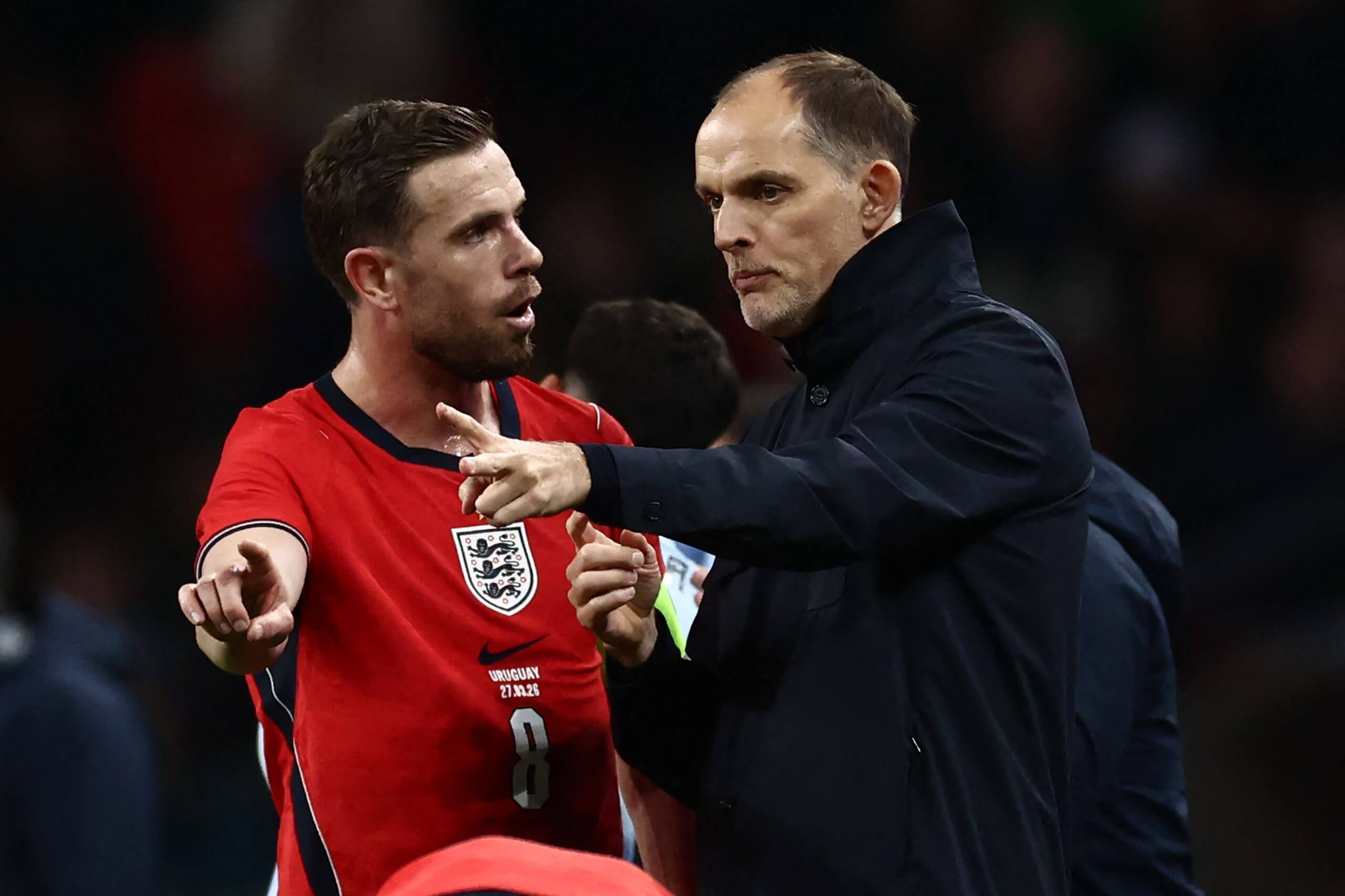 England's Jordan Henderson pictured in conversation with Thomas Tuchel in MArch