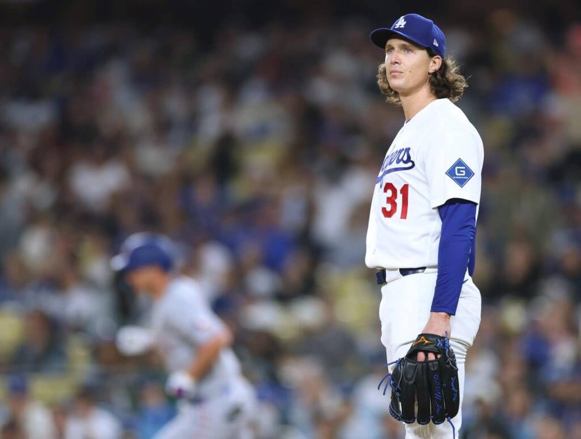 Tyler Glasnow reacts after allowing a three-run home run against Corey Seager during a game at Dodger Stadium.