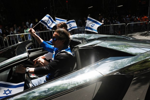 NEW YORK, NEW YORK - MAY 31: Thousands of Jewish and Israeli Americans participate in the annual Israeli Day Parade, the world's largest pro-Israel parade, on May 31, 2026, in New York City. This year's event takes place under heightened security with hundreds of police, K-9 units, and undercover officers patrolling the route up 5th Avenue. New York City mayor Zohran Mamdani did not attend the parade, the first mayor in recent history not to do so. (Photo by Spencer Platt/Getty Images)