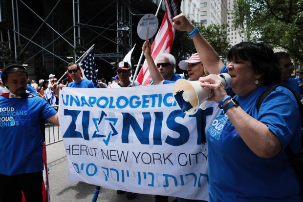 NEW YORK, NEW YORK - MAY 31: Thousands of Jewish and Israeli Americans participate in the annual Israeli Day Parade, the world's largest pro-Israel parade, on May 31, 2026, in New York City. This year's event takes place under heightened security with hundreds of police, K-9 units, and undercover officers patrolling the route up 5th Avenue. New York City mayor Zohran Mamdani did not attend the parade, the first mayor in recent history not to do so. (Photo by Spencer Platt/Getty Images)