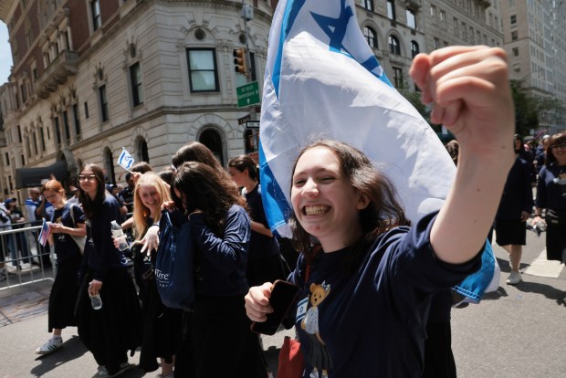 NEW YORK, NEW YORK - MAY 31: Thousands of Jewish and Israeli Americans participate in the annual Israeli Day Parade, the world's largest pro-Israel parade, on May 31, 2026, in New York City. This year's event takes place under heightened security with hundreds of police, K-9 units, and undercover officers patrolling the route up 5th Avenue. New York City mayor Zohran Mamdani did not attend the parade, the first mayor in recent history not to do so. (Photo by Spencer Platt/Getty Images)