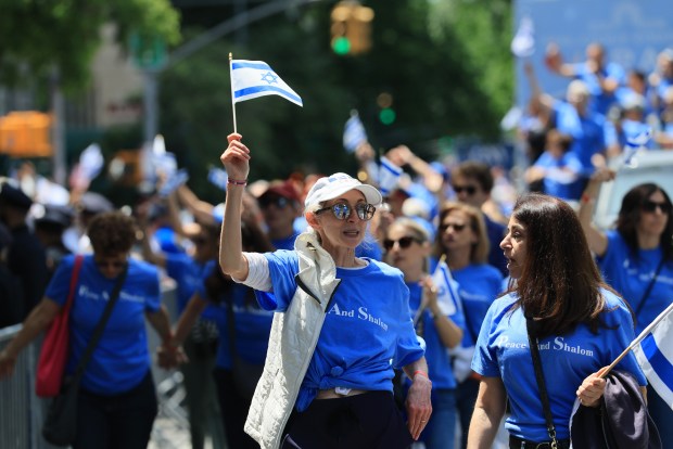 NEW YORK, NEW YORK - MAY 31: Thousands of Jewish and Israeli Americans participate in the annual Israeli Day Parade, the world's largest pro-Israel parade, on May 31, 2026, in New York City. This year's event takes place under heightened security with hundreds of police, K-9 units and undercover officers patrolling the route up 5th Avernue. New York City mayor Zohran Mamdani did not attend the parade, the first mayor in recent history not to do so. (Photo by Spencer Platt/Getty Images)