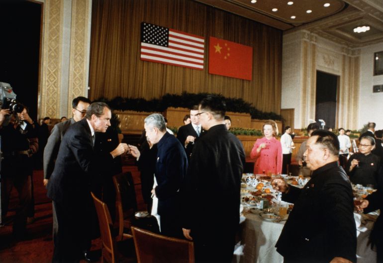 President Nixon is greeted by Chinese officials at a banquet given by Chou En-Lai at the Great Hall of the People. (Photo by © CORBIS/Corbis via Getty Images)