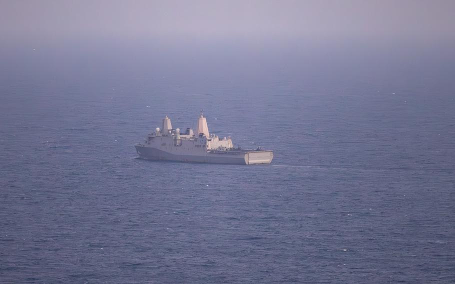 The ship at sea.