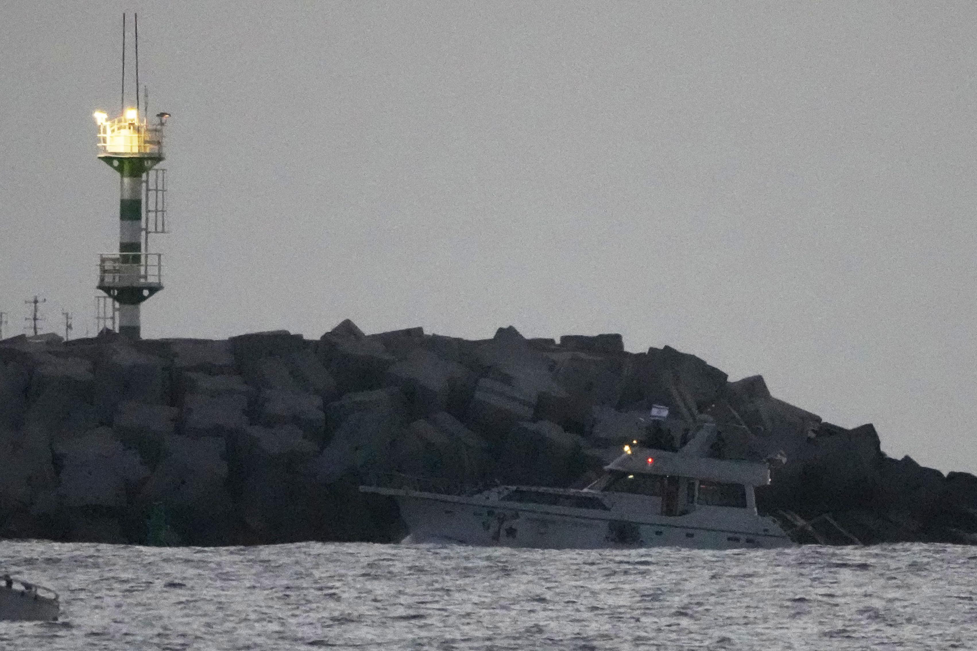 Israeli naval forces sail a confiscated Gaza-bound flotilla boat into Ashdod port.