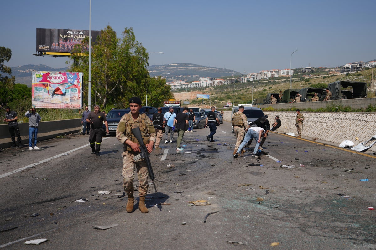Israeli airstrikes kill at least 13 in Lebanon as drone strikes near Beirut leave four dead