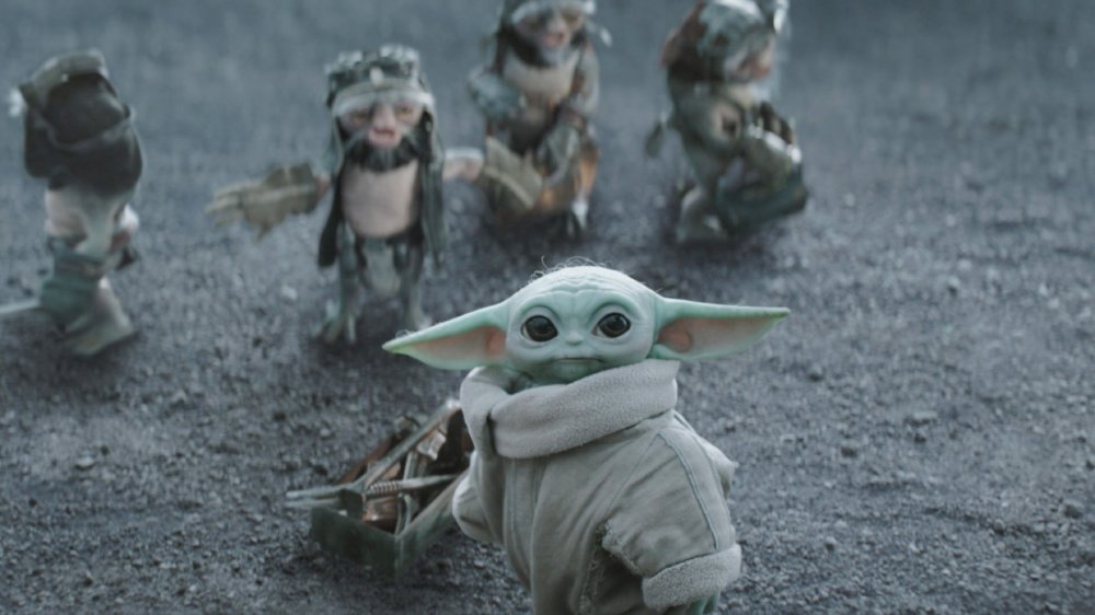 STAR WARS: THE MANDALORIAN AND GROGU, Grogu (front) with Anzellans, 2026. © Walt Disney Studios Motion Pictures / Courtesy Everett Collection