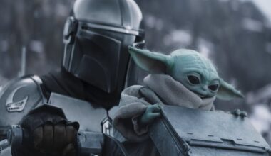 STAR WARS: THE MANDALORIAN AND GROGU, from left: Pedro Pascal as The Mandalorian / Din Djarin, Grogu, 2026. © Walt Disney Studios Motion Pictures / Courtesy Everett Collection